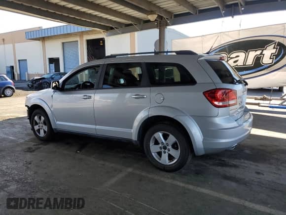2011 Dodge Journey Mainstreet с VIN 3D4PG1FG0BT517764, выставлен на аукционе Copart как лот 81807505 с пробегом 151 594 миль миль и Списание • Salvage title. История ставок и продаж доступна на DreamBid. Изображение 2.