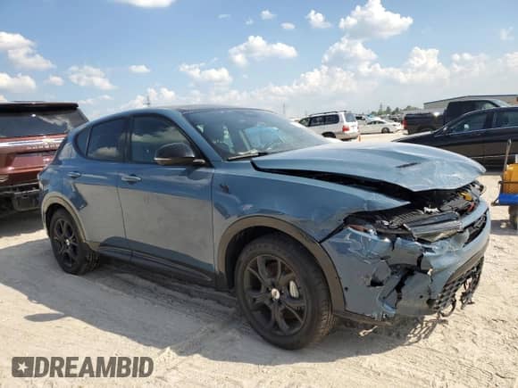 2024 Dodge Hornet R/T Plus с VIN ZACPDFDW6R3A22300, выставлен на аукционе Copart как лот 69647344 с пробегом Не указан миль и Списание • Salvage title. История ставок и продаж доступна на DreamBid. Изображение 4.