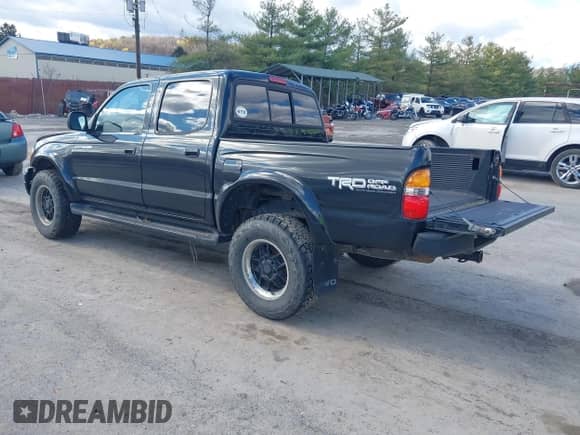 2003 Toyota Tacoma z VIN 5TEHN72N53Z249453, wystawiony jako IAAI lot #43472155 z przebiegiem 162 053 mil mil oraz . Historia ofert i sprzedaży dostępna na DreamBid. Obrazek 3.