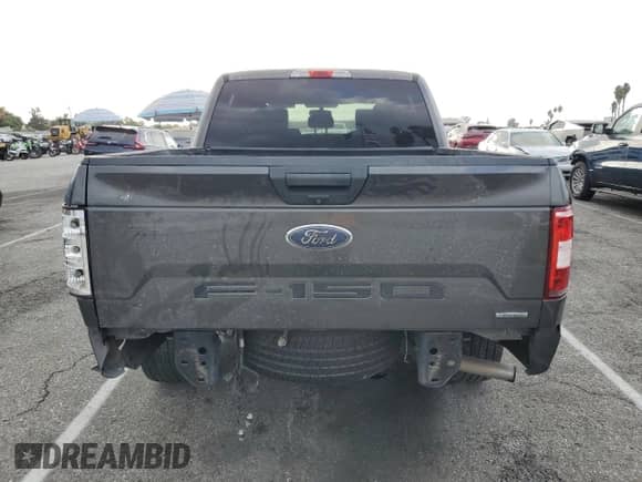 2018 Ford F-150 XL z VIN 1FTEW1CP7JKC25122, wystawiony jako Copart lot #86538425 z przebiegiem 118 557 mil mil oraz Szkoda całkowita • Salvage title. Historia ofert i sprzedaży dostępna na DreamBid. Obrazek 6.