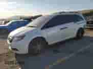 2014 Honda Odyssey LX с VIN 5FNRL5H21EB085263, выставлен на аукционе Copart как лот 67487965 с пробегом 156 812 миль миль и Списание • Salvage title. История ставок и продаж доступна на DreamBid. Изображение 1.