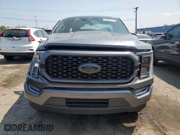 2021 Ford F-150 XL with VIN 1FTMF1E58MKD90530, listed as a Copart auction lot 61824123 with 5,656 mi miles and . Bid and sale history available at DreamBid. Image 5.
