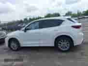 2024 Mazda CX-5 S Preferred z VIN JM3KFBCL3R0456491, wystawiony jako IAAI lot #43289902 z przebiegiem 20 370 mil mil oraz . Historia ofert i sprzedaży dostępna na DreamBid. Obrazek 14.