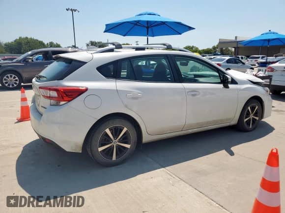 2019 Subaru Impreza Premium with VIN 4S3GTAD67K3738552, listed as a Copart auction lot 71272245 with 104,659 mi miles and Salvage title. Bid and sale history available at DreamBid. Image 3.