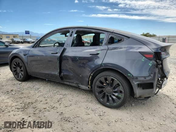 2021 Tesla Model Y Long Range with VIN 5YJYGDEEXMF282598, listed as a Copart auction lot 71928785 with 101,186 mi miles and Salvage title. Bid and sale history available at DreamBid. Image 2.