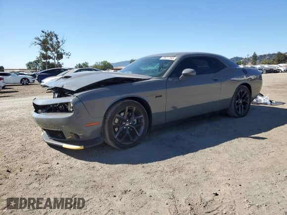 2023 Dodge Challenger R/T с VIN 2C3CDZBT3PH621157, выставлен на аукционе Copart как лот 69637345 с пробегом 38 308 миль миль и Списание • Salvage title. История ставок и продаж доступна на DreamBid. Изображение 1.