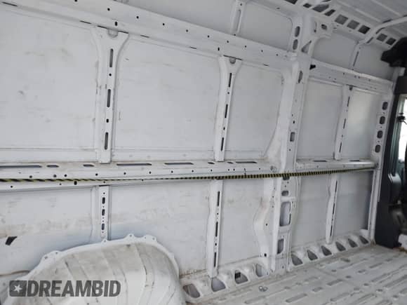 2023 Ram ProMaster Cargo with VIN 3C6LRVDG4PE571992, listed as a IAAI auction lot 43115959 with 62,513 mi miles and . Bid and sale history available at DreamBid. Image 8.