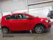 2014 Chevrolet Sonic LT z VIN 1G1JD6SH8E4164720, wystawiony jako IAAI lot #43169999 z przebiegiem 91 833 mil mil oraz . Historia ofert i sprzedaży dostępna na DreamBid. Obrazek 14.