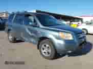 2006 Honda Pilot EX-L with VIN 2HKYF18726H561160, listed as a IAAI auction lot 43045097 with 245,110 mi miles and . Bid and sale history available at DreamBid. Image 1.