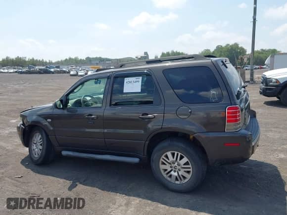 2007 Mercury Mariner Premier with VIN 4M2CU971X7KJ11054, listed as a IAAI auction lot 42813499 with 151,165 mi miles and . Bid and sale history available at DreamBid. Image 14.