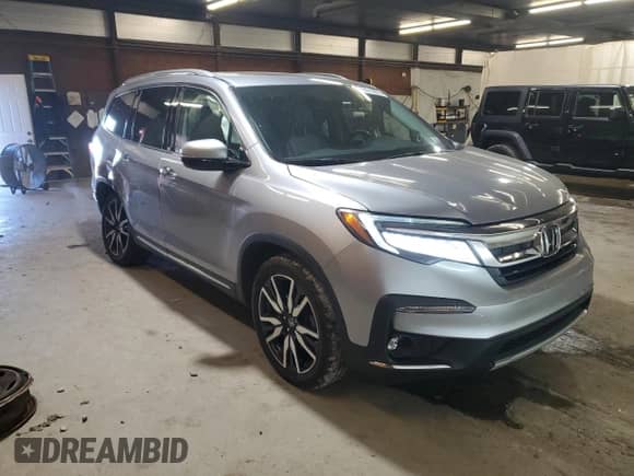 2019 Honda Pilot Touring 8-Passenger with VIN 5FNYF6H95KB024032, listed as a Copart auction lot 84618695 with 98,694 mi miles and Salvage title. Bid and sale history available at DreamBid. Image 4.