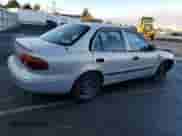 2001 Chevrolet Prizm с VIN 1Y1SK52801Z409188, выставлен на аукционе Copart как лот 80757824 с пробегом Не указан миль и Списание • Salvage title. История ставок и продаж доступна на DreamBid. Изображение 3.