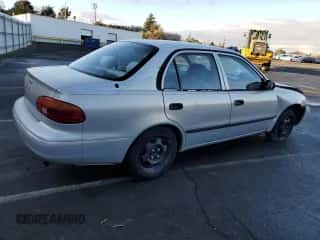 2001 Chevrolet Prizm с VIN 1Y1SK52801Z409188, выставлен на аукционе Copart как лот 80757824 с пробегом Не указан миль и Списание • Salvage title. История ставок и продаж доступна на DreamBid. Изображение 3.