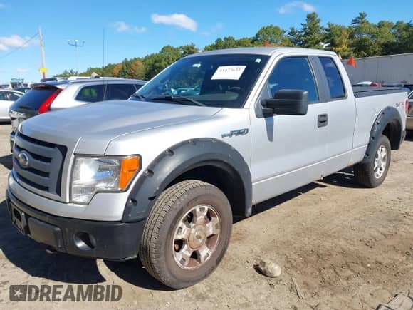 2009 Ford F-150 STX with VIN 1FTRX14849KB58416, listed as a IAAI auction lot 43477632 with 143,008 mi miles and . Bid and sale history available at DreamBid. Image 2.