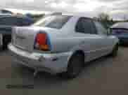 2005 Hyundai Accent GLS z VIN KMHCG45C45U631414, wystawiony jako Copart lot #73963814 z przebiegiem 106 617 mil mil oraz Szkoda całkowita • Salvage title. Historia ofert i sprzedaży dostępna na DreamBid. Obrazek 3.