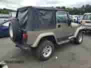 2004 Jeep Wrangler Sahara с VIN 1J4FA59S84P801582, выставлен на аукционе Copart как лот 64183535 с пробегом 127 213 миль миль и Списание • Salvage title. История ставок и продаж доступна на DreamBid. Изображение 3.