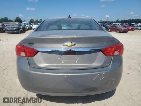 2018 Chevrolet Impala LT с VIN 2G1105SA9J9165391, выставлен на аукционе Copart как лот 71071715 с пробегом 52 003 миль миль и Списание • Salvage title. История ставок и продаж доступна на DreamBid. Изображение 6.