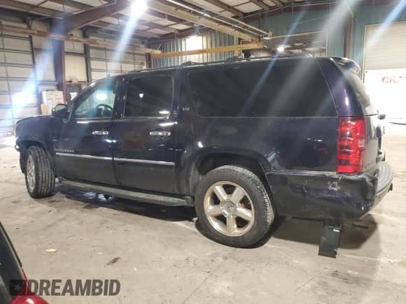 2014 Chevrolet Suburban LTZ with VIN 1GNSCKE05ER176024, listed as a Copart auction lot 45469385 with 215,366 mi miles and Salvage title. Bid and sale history available at DreamBid. Image 2.