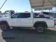 2021 Toyota Tacoma SR5 с VIN 3TMAZ5CN7MM144212, выставлен на аукционе IAAI как лот 41286049 с пробегом 75 113 миль миль и . История ставок и продаж доступна на DreamBid. Изображение 14.