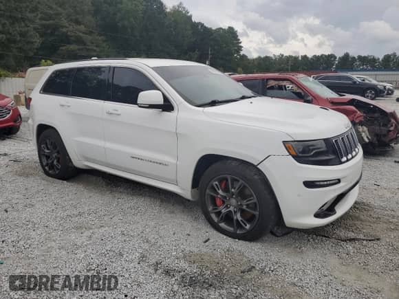2015 Jeep Grand Cherokee SRT z VIN 1C4RJFDJ0FC942650, wystawiony jako Copart lot #84007895 z przebiegiem 144 016 mil mil oraz Czysty tytuł • Clean title. Historia ofert i sprzedaży dostępna na DreamBid. Obrazek 4.