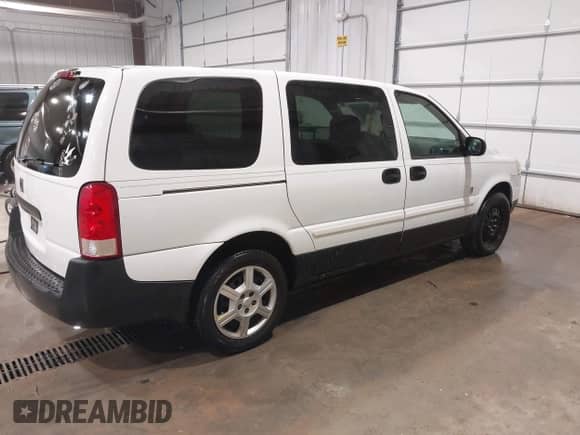 2005 Saturn Relay 2 with VIN 5GZDV03L35D290547, listed as a IAAI auction lot 42131202 with 231,279 mi miles and . Bid and sale history available at DreamBid. Image 4.