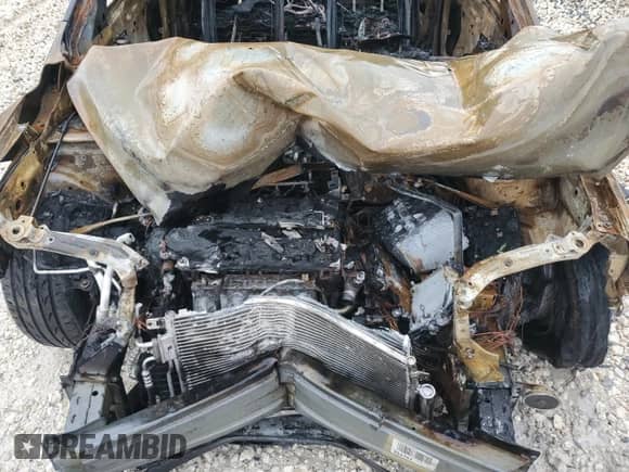 2013 Chevrolet Sonic LTZ с VIN 1G1JE5SHXD4169990, выставлен на аукционе Copart как лот 80101435 с пробегом Не указан миль и На запчасти • Non repairable. История ставок и продаж доступна на DreamBid. Изображение 11.