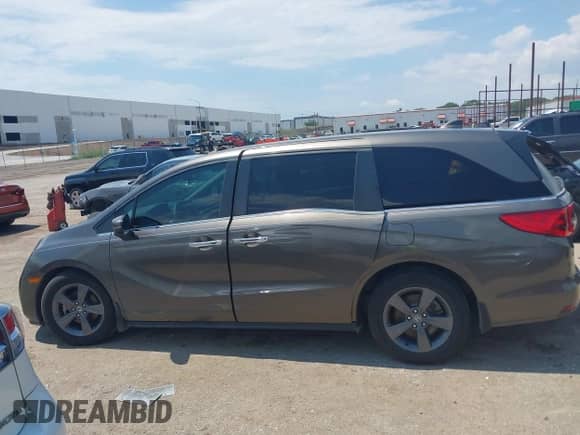 2021 Honda Odyssey EX z VIN 5FNRL6H50MB027580, wystawiony jako IAAI lot #43055794 z przebiegiem 96 516 mil mil oraz . Historia ofert i sprzedaży dostępna na DreamBid. Obrazek 13.