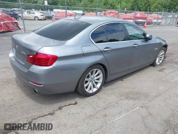 2015 BMW 5 Series 535i xDrive with VIN WBA5B3C51FD540464, listed as a IAAI auction lot 42644013 with 115,383 mi miles and . Bid and sale history available at DreamBid. Image 4.