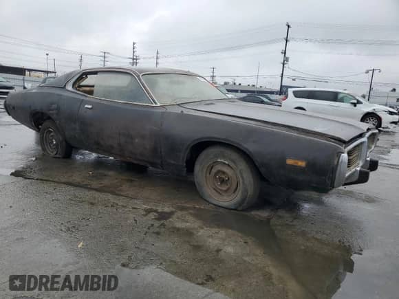 1973 Dodge Charger with VIN WH23G3G245906, listed as a Copart auction lot 42392095 with 26,222 mi miles and Clean title. Bid and sale history available at DreamBid. Image 4.