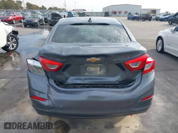 2018 Chevrolet Cruze LT z VIN 1G1BE5SM2J7188657, wystawiony jako IAAI lot #43440260 z przebiegiem 173 856 mil mil oraz . Historia ofert i sprzedaży dostępna na DreamBid. Obrazek 16.