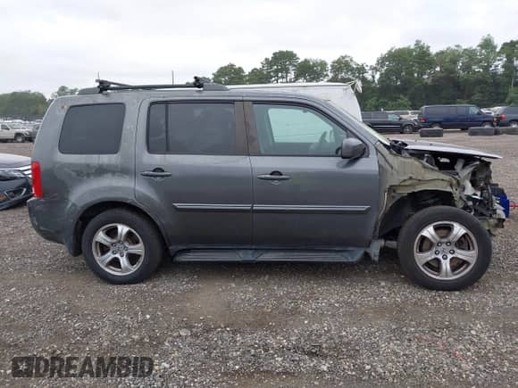 2013 Honda Pilot EX-L with VIN 5FNYF4H56DB002982, listed as a IAAI auction lot 42999082 with 113,189 mi miles and . Bid and sale history available at DreamBid. Image 13.