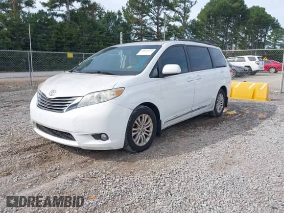2012 Toyota Sienna XLE with VIN 5TDYK3DC4CS231407, listed as a IAAI auction lot 43531271 with 382,802 mi miles and . Bid and sale history available at DreamBid. Image 2.