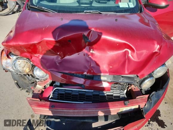 2012 Chevrolet Sonic LS z VIN 1G1JA6SH8C4125633, wystawiony jako Copart lot #84836985 z przebiegiem 80 961 mil mil oraz Szkoda całkowita • Salvage title. Historia ofert i sprzedaży dostępna na DreamBid. Obrazek 11.