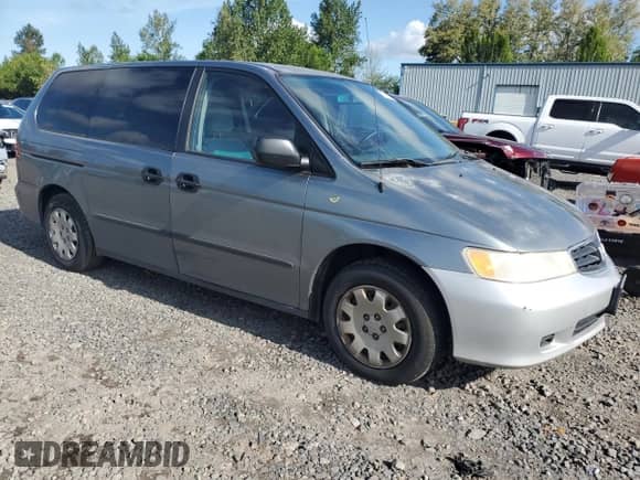 2001 Honda Odyssey LX с VIN 2HKRL18531H540774, выставлен на аукционе Copart как лот 57670255 с пробегом 209 379 миль миль и Списание • Salvage title. История ставок и продаж доступна на DreamBid. Изображение 4.