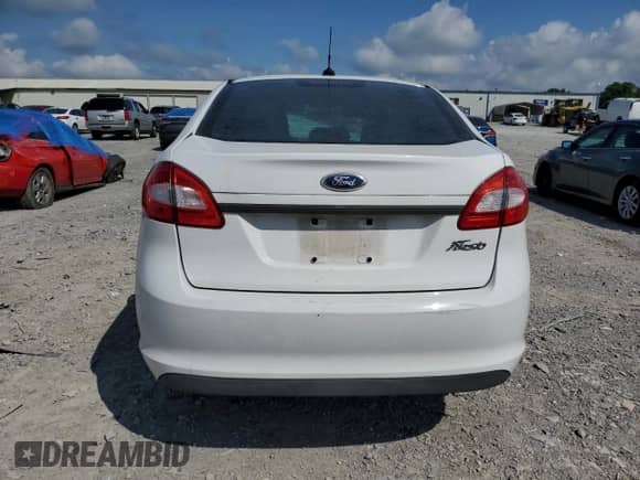 2012 Ford Fiesta S с VIN 3FADP4AJ3CM142510, выставлен на аукционе Copart как лот 64338485 с пробегом Не указан миль и Чистый • Clean title. История ставок и продаж доступна на DreamBid. Изображение 6.