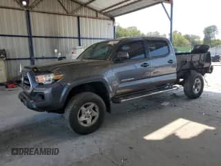 2017 Toyota Tacoma SR5 с VIN 5TFDZ5BN0HX018904, выставлен на аукционе Copart как лот 71979255 с пробегом 140 458 миль миль и Списание • Salvage title. История ставок и продаж доступна на DreamBid. Изображение 1.