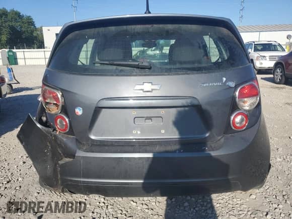 2013 Chevrolet Sonic LT с VIN 1G1JC6SH4D4108422, выставлен на аукционе Copart как лот 70085545 с пробегом 151 635 миль миль и Списание • Salvage title. История ставок и продаж доступна на DreamBid. Изображение 6.