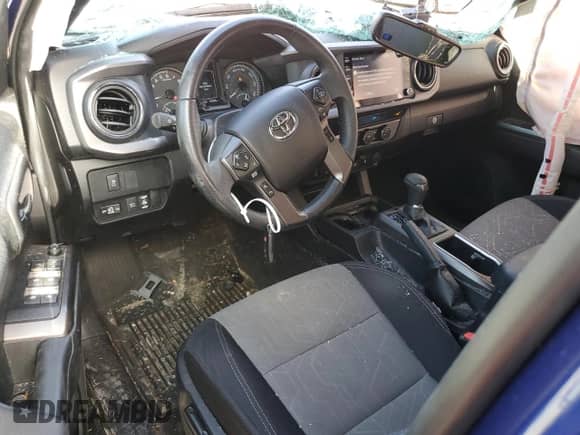 2022 Toyota Tacoma SR5 with VIN 3TYDZ5BN0NT005849, listed as a Copart auction lot 71113125 with 63,449 mi miles and Salvage title. Bid and sale history available at DreamBid. Image 8.