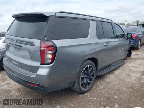 2023 Chevrolet Suburban RST with VIN 1GNSKEKD7PR329839, listed as a IAAI auction lot 41899376 with 47,444 mi miles and . Bid and sale history available at DreamBid. Image 4.