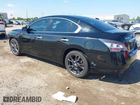 2014 Nissan Maxima S z VIN 1N4AA5AP4EC498516, wystawiony jako IAAI lot #43125499 z przebiegiem 159 797 mil mil oraz . Historia ofert i sprzedaży dostępna na DreamBid. Obrazek 3.