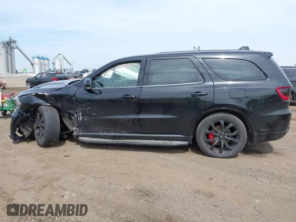 2019 Dodge Durango R/T with VIN 1C4SDJCT0KC803708, listed as a IAAI auction lot 42140445 with 50,246 mi miles and . Bid and sale history available at DreamBid. Image 14.