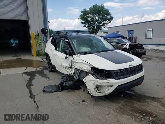 2020 Jeep Compass Trailhawk z VIN 3C4NJDDB6LT184728, wystawiony jako Copart lot #65729635 z przebiegiem Nie podano mil oraz Szkoda całkowita • Salvage title. Historia ofert i sprzedaży dostępna na DreamBid. Obrazek 15.
