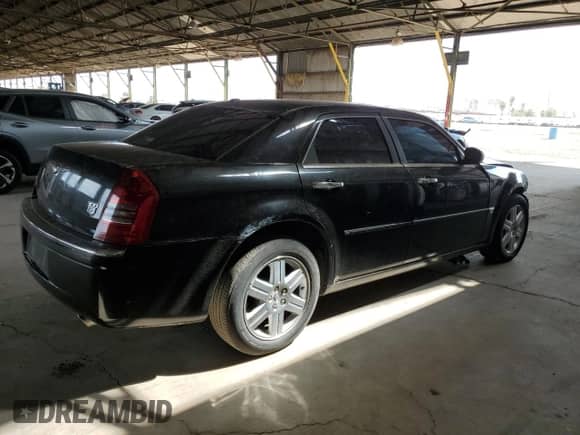 2006 Chrysler 300 C with VIN 2C3KK63H56H280630, listed as a Copart auction lot 70354265 with 87,547 mi miles and Salvage title. Bid and sale history available at DreamBid. Image 3.
