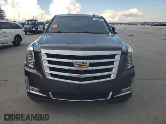 2015 Cadillac Escalade ESV Premium с VIN 1GYS3TKJ1FR505650, выставлен на аукционе Copart как лот 68464835 с пробегом Не указан миль и Списание • Salvage title. История ставок и продаж доступна на DreamBid. Изображение 5.