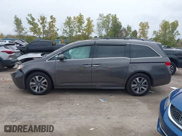 2016 Honda Odyssey Touring Elite с VIN 5FNRL5H94GB058168, выставлен на аукционе IAAI как лот 43302272 с пробегом 233 057 миль миль и . История ставок и продаж доступна на DreamBid. Изображение 14.