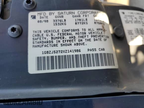 1999 Saturn SL with VIN 1G8ZJ5272XZ141986, listed as a Copart auction lot 71496674 with Not provided miles and Salvage title. Bid and sale history available at DreamBid. Image 13.