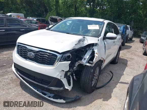 2020 Kia Sorento LX with VIN 5XYPG4A52LG676525, listed as a IAAI auction lot 42759112 with 107,868 mi miles and . Bid and sale history available at DreamBid. Image 2.
