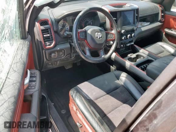 2020 Ram 1500 Rebel z VIN 1C6SRFLT2LN199221, wystawiony jako Copart lot #68965755 z przebiegiem 49 714 mil mil oraz Szkoda całkowita • Salvage title. Historia ofert i sprzedaży dostępna na DreamBid. Obrazek 8.