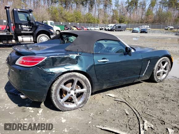 2007 Saturn Sky Red Line with VIN 1G8MG35X57Y131127, listed as a Copart auction lot 49488585 with 142,229 mi miles and Salvage title. Bid and sale history available at DreamBid. Image 3.
