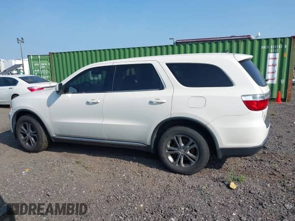 2012 Dodge Durango SXT z VIN 1C4RDJAG6CC312484, wystawiony jako IAAI lot #42822338 z przebiegiem 201 544 mil mil oraz . Historia ofert i sprzedaży dostępna na DreamBid. Obrazek 14.